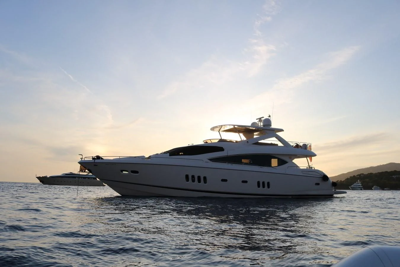 a white yacht on the water aboard LI-JOR Yacht for Sale