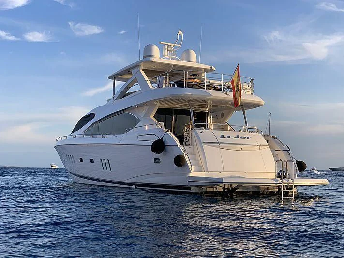 a white boat in the water aboard LI-JOR Yacht for Sale