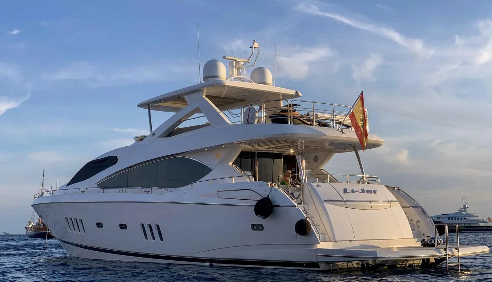 a white yacht on the water aboard LI-JOR Yacht for Sale