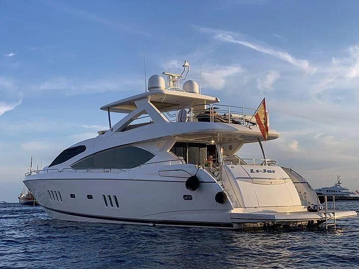 a large white boat aboard LI-JOR Yacht for Sale