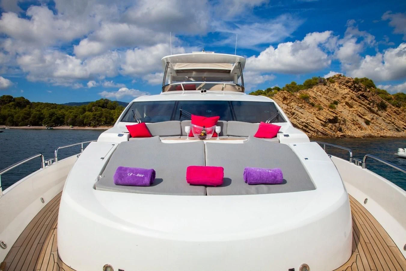 a boat with a pink bow on the front aboard LI-JOR Yacht for Sale