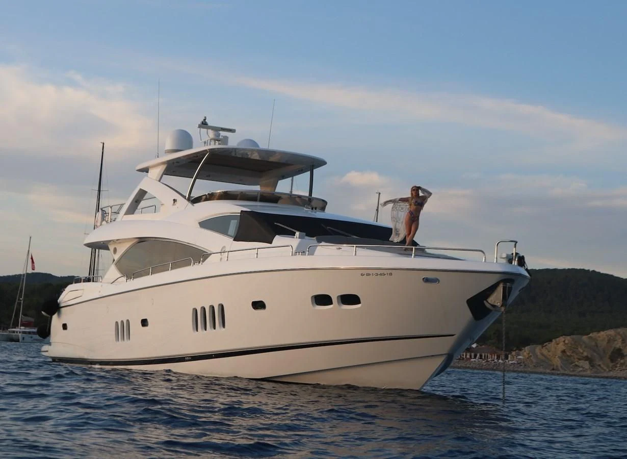 a white yacht in the water aboard LI-JOR Yacht for Sale