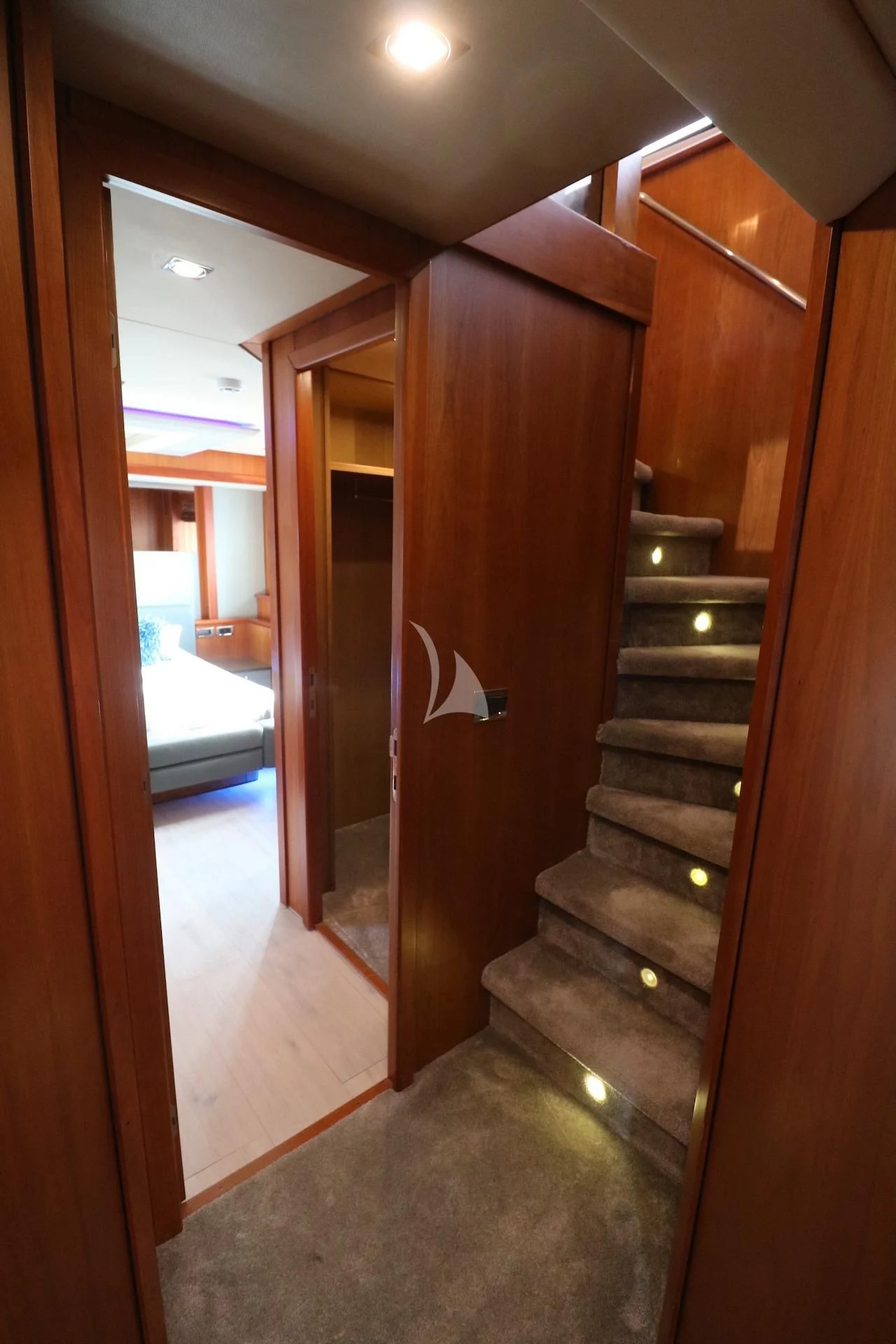 a room with a wood door aboard LI-JOR Yacht for Sale