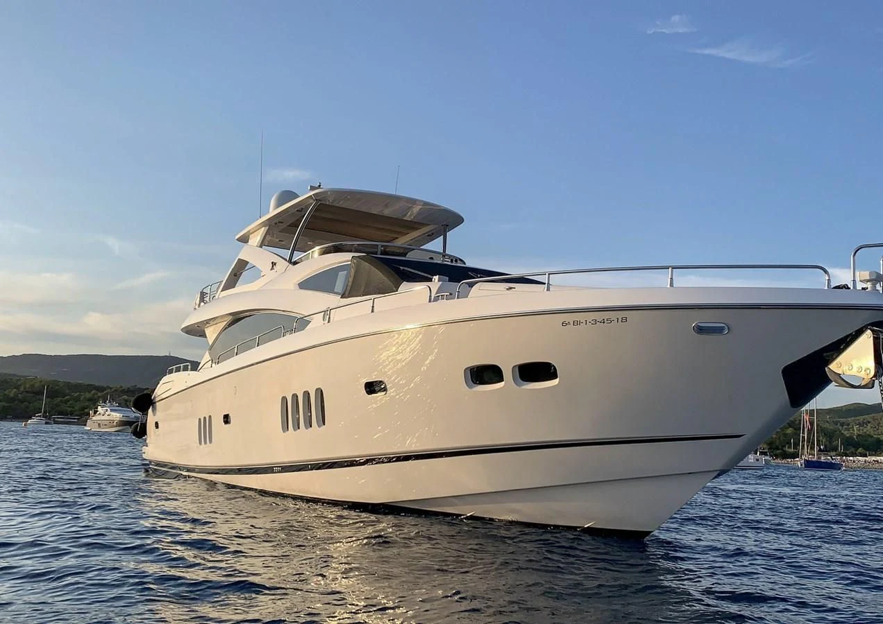 a white yacht on the water aboard LI-JOR Yacht for Sale