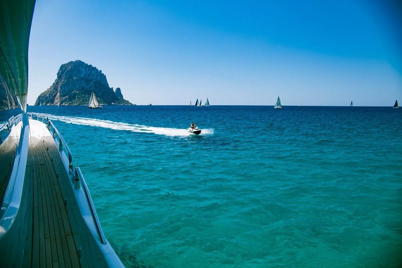a group of boats on the water aboard LI-JOR Yacht for Sale