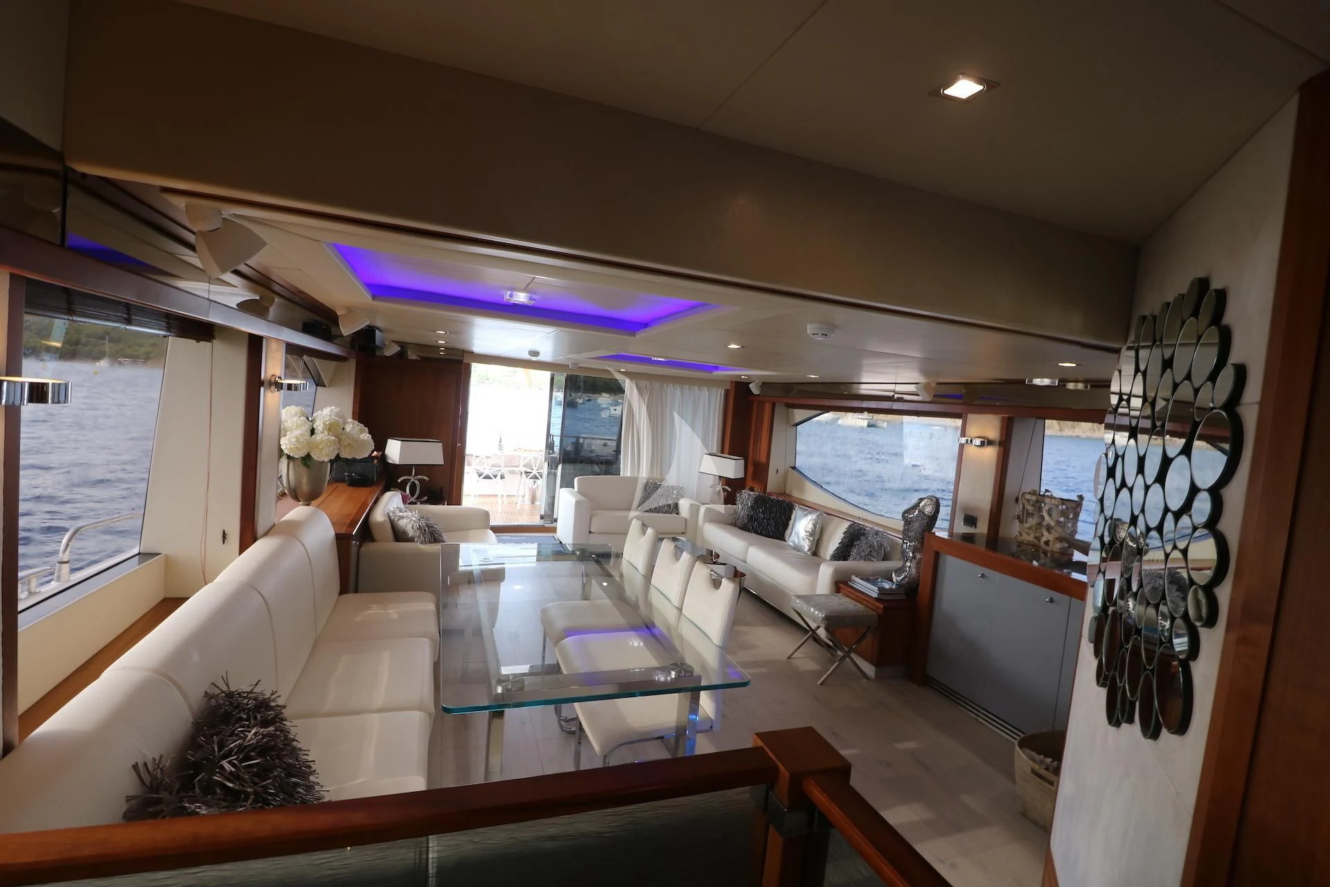 a living room with a large window aboard LI-JOR Yacht for Sale
