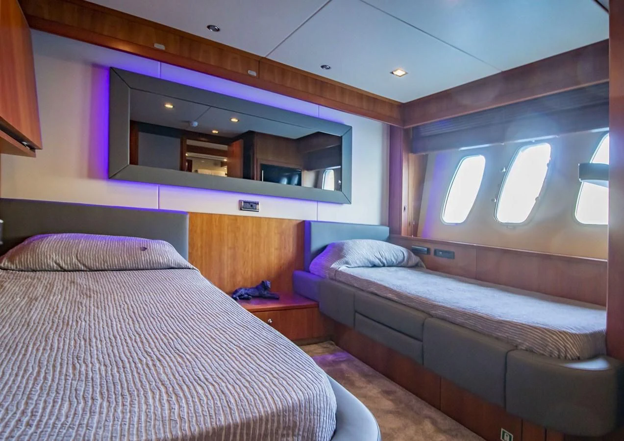 a room with two beds aboard LI-JOR Yacht for Sale