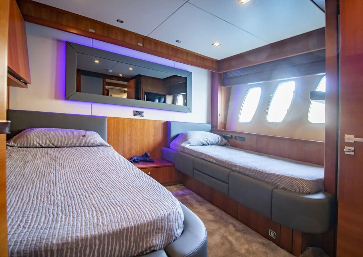 a room with two beds aboard LI-JOR Yacht for Sale