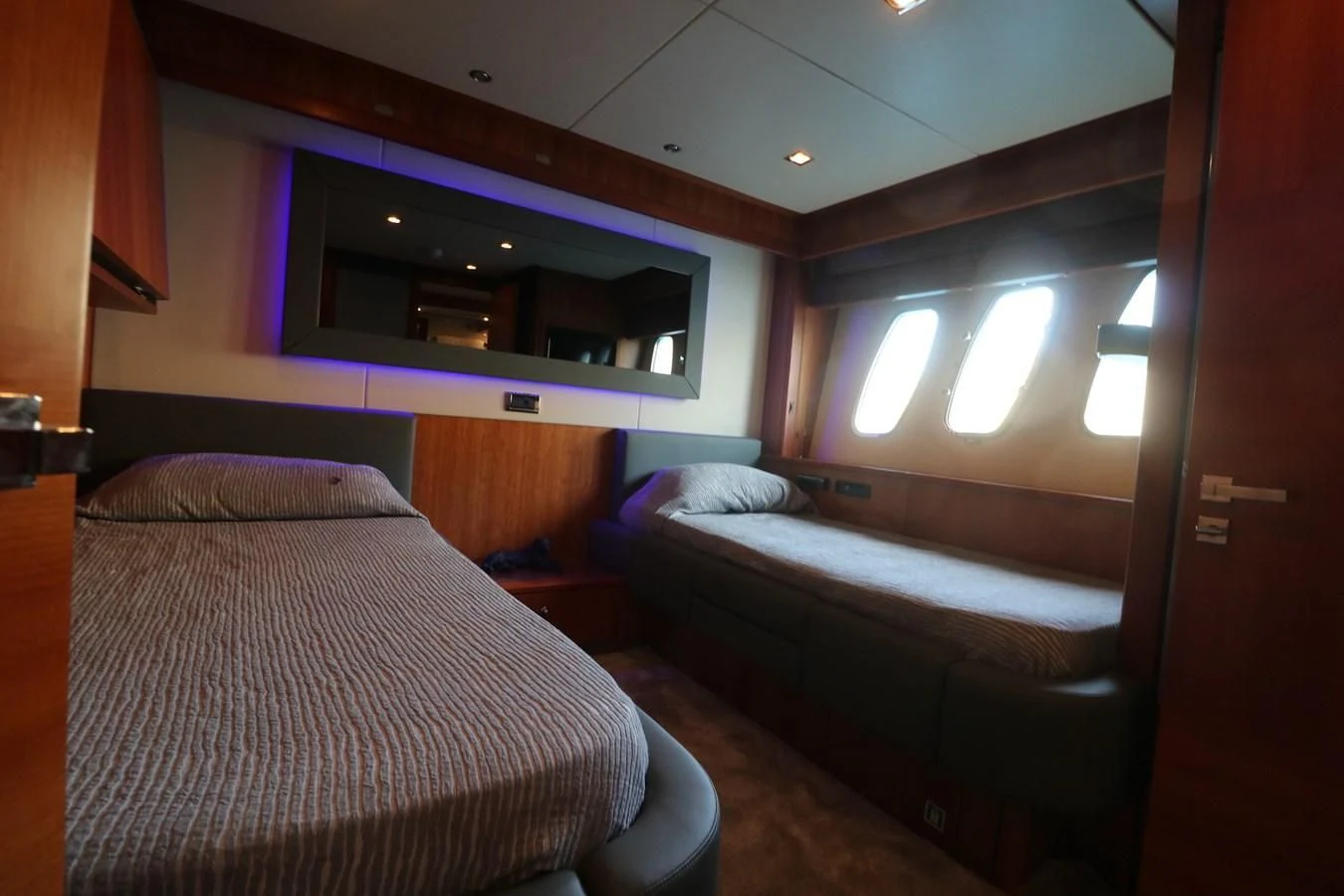 a room with two beds aboard LI-JOR Yacht for Sale