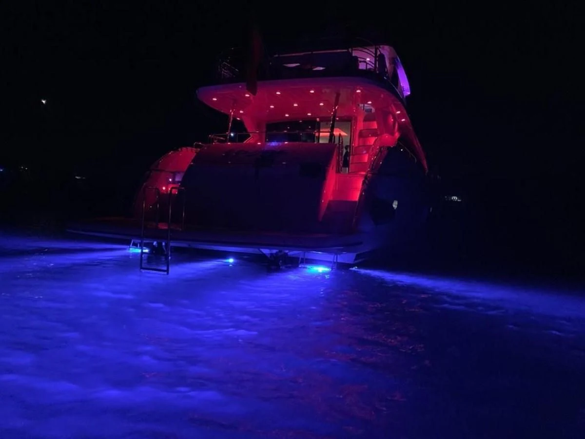 a red car on a road aboard LI-JOR Yacht for Sale