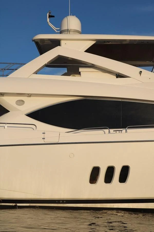 a white yacht on the water aboard LI-JOR Yacht for Sale