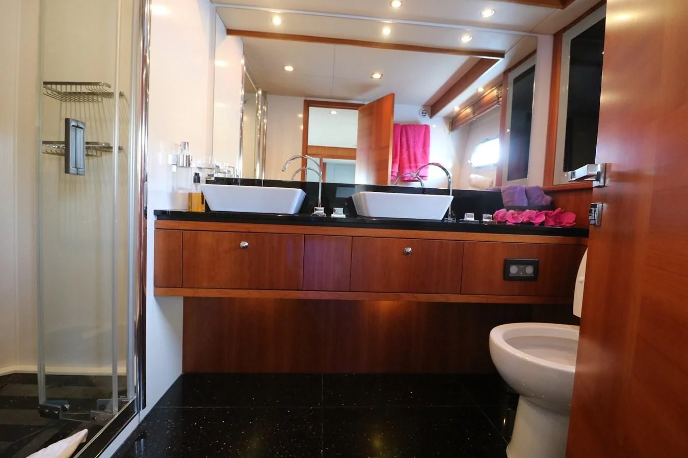 a bathroom with a sink and a toilet aboard LI-JOR Yacht for Sale