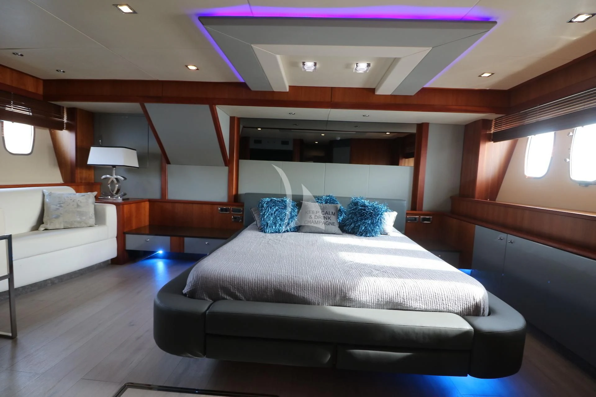 a room with a bed and a couch aboard LI-JOR Yacht for Sale