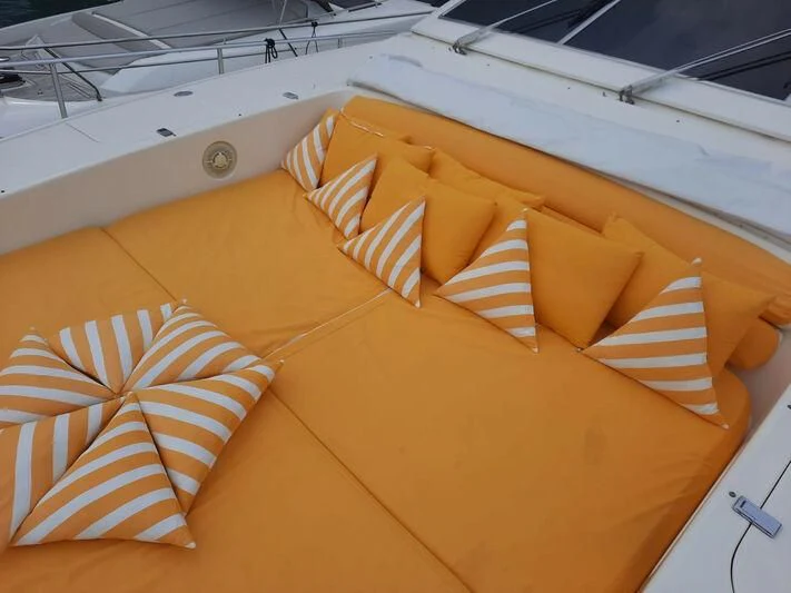 a boat with many pillows aboard DG Yacht for Sale