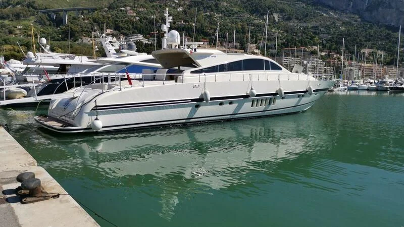 a group of boats in a harbor aboard DG Yacht for Sale