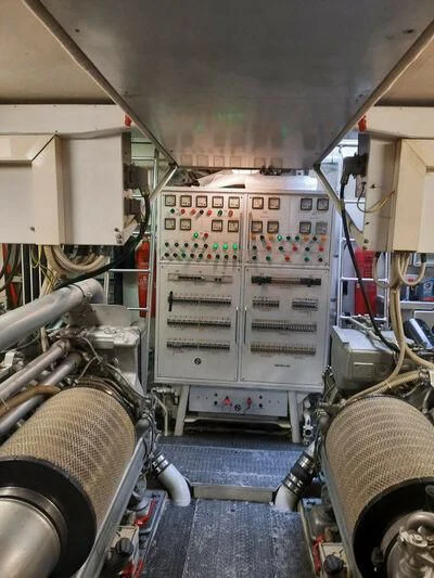 a machine with a large piece of equipment in it aboard DG Yacht for Sale