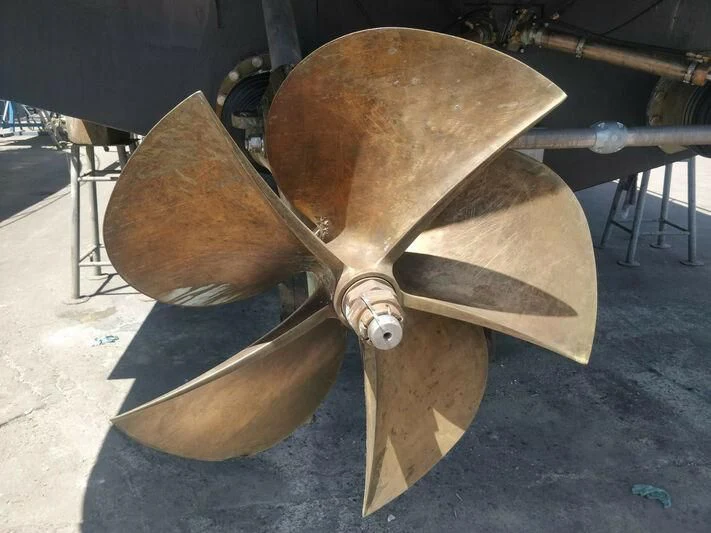 a wooden propeller on a boat aboard DG Yacht for Sale