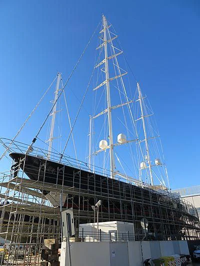 a large crane with a blue sky aboard LA LUNA Yacht for Sale