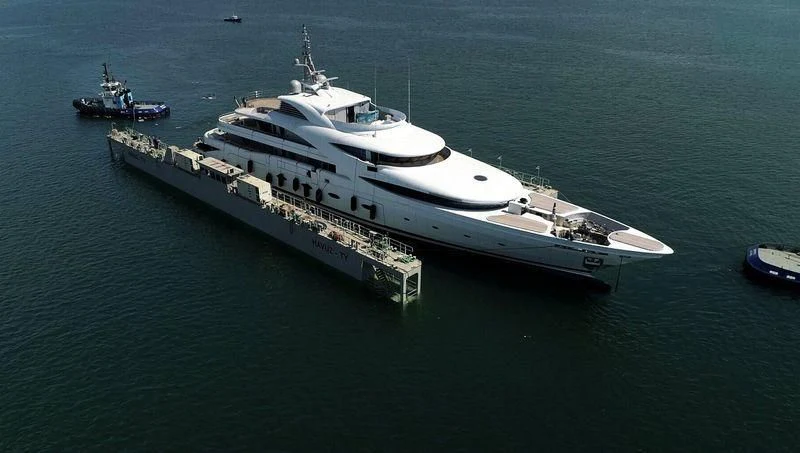 a large white boat in the water aboard VICTORIA Yacht for Sale
