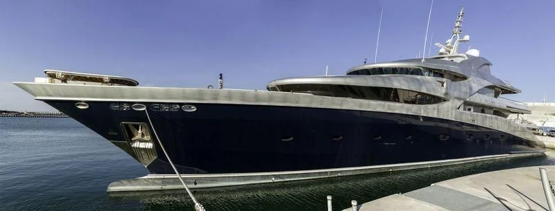 a large ship on the water aboard VICTORIA Yacht for Sale