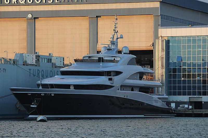 a large ship docked aboard VICTORIA Yacht for Sale