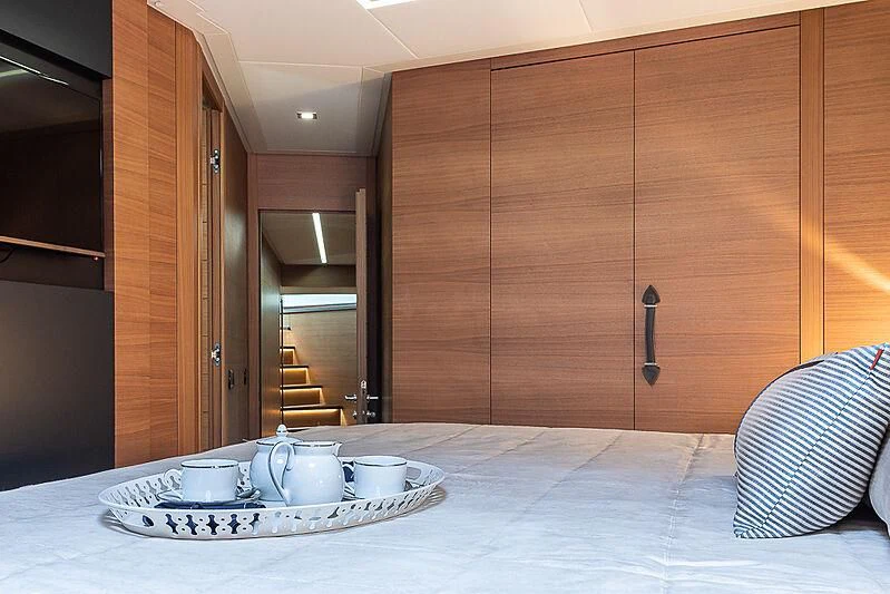 a kitchen with a table and chairs aboard KIKI V Yacht for Sale