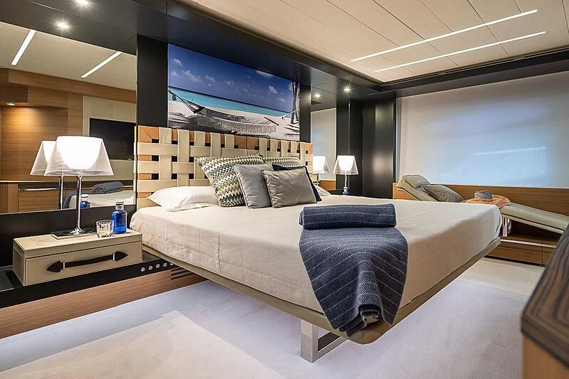 a bed in a room aboard KIKI V Yacht for Sale