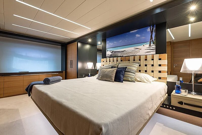 a bed in a room aboard KIKI V Yacht for Sale