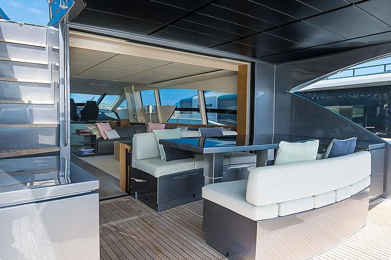 a room with a couch and a table aboard KIKI V Yacht for Sale