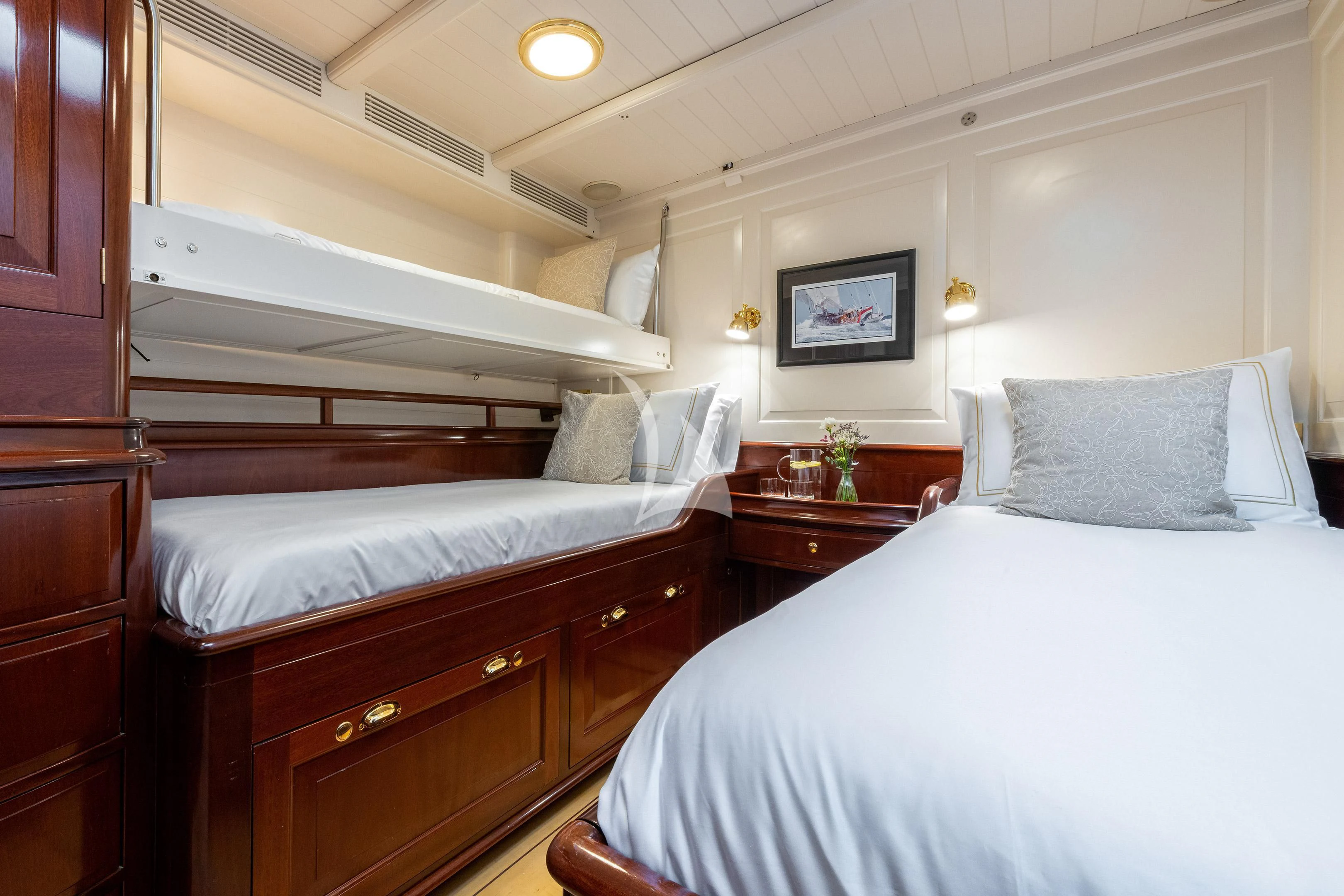 a bedroom with two beds aboard WINDROSE OF AMSTERDAM Yacht for Sale