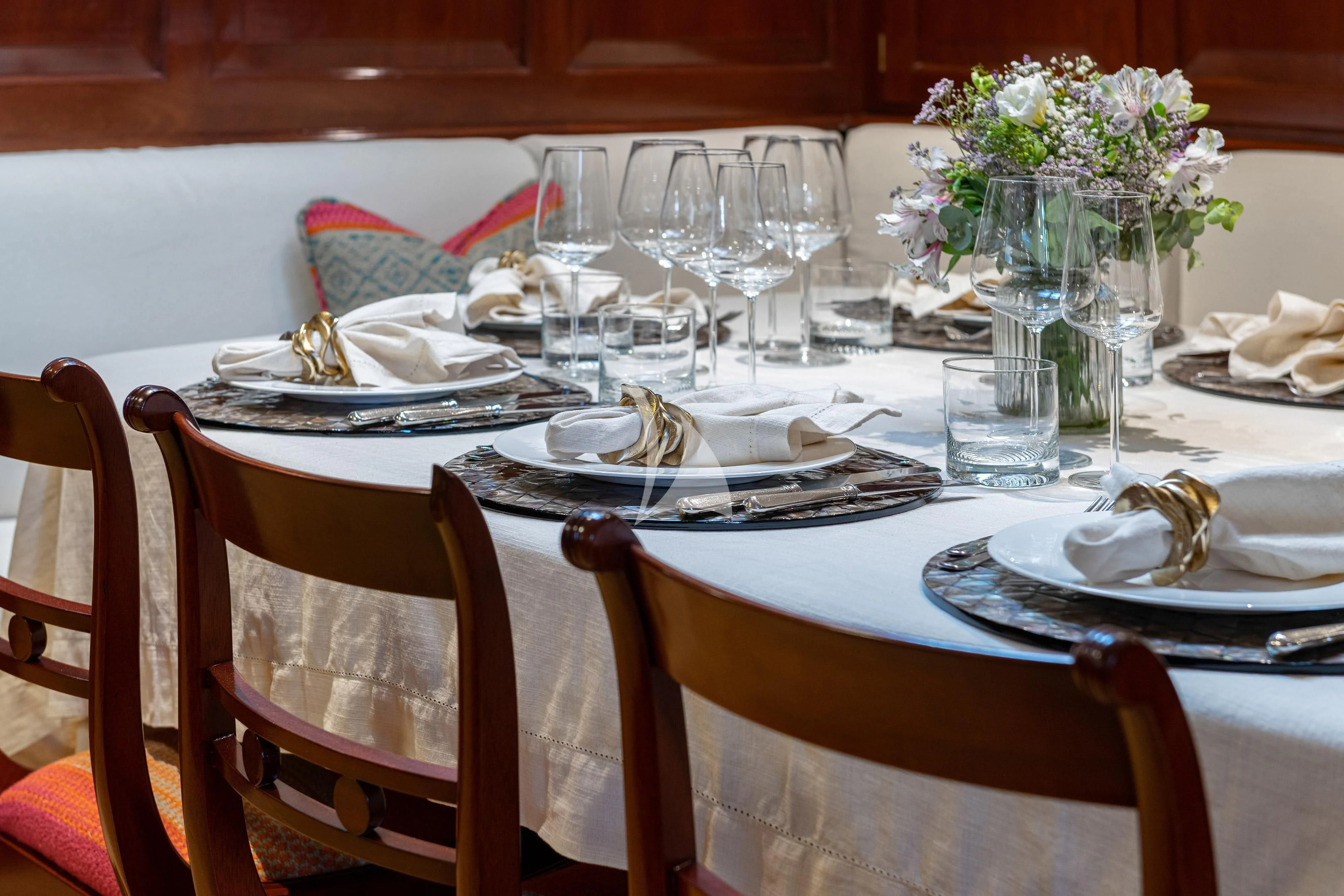 a table set with place settings aboard WINDROSE OF AMSTERDAM Yacht for Sale