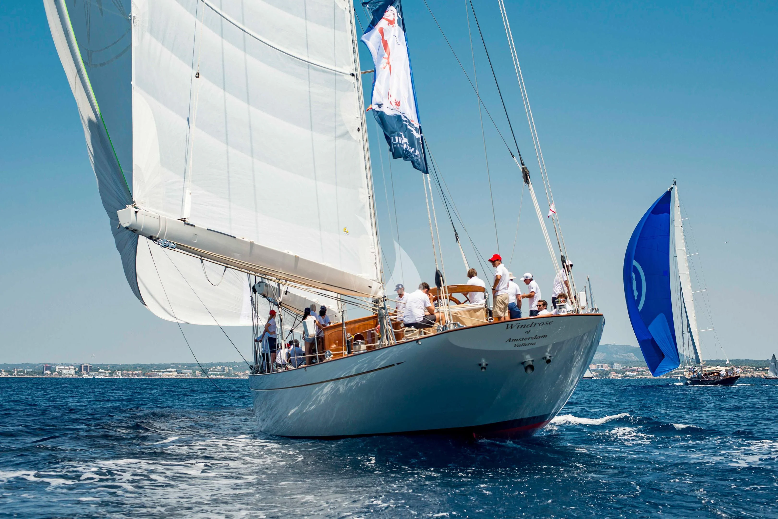 a group of people sailing on a boat aboard WINDROSE OF AMSTERDAM Yacht for Sale