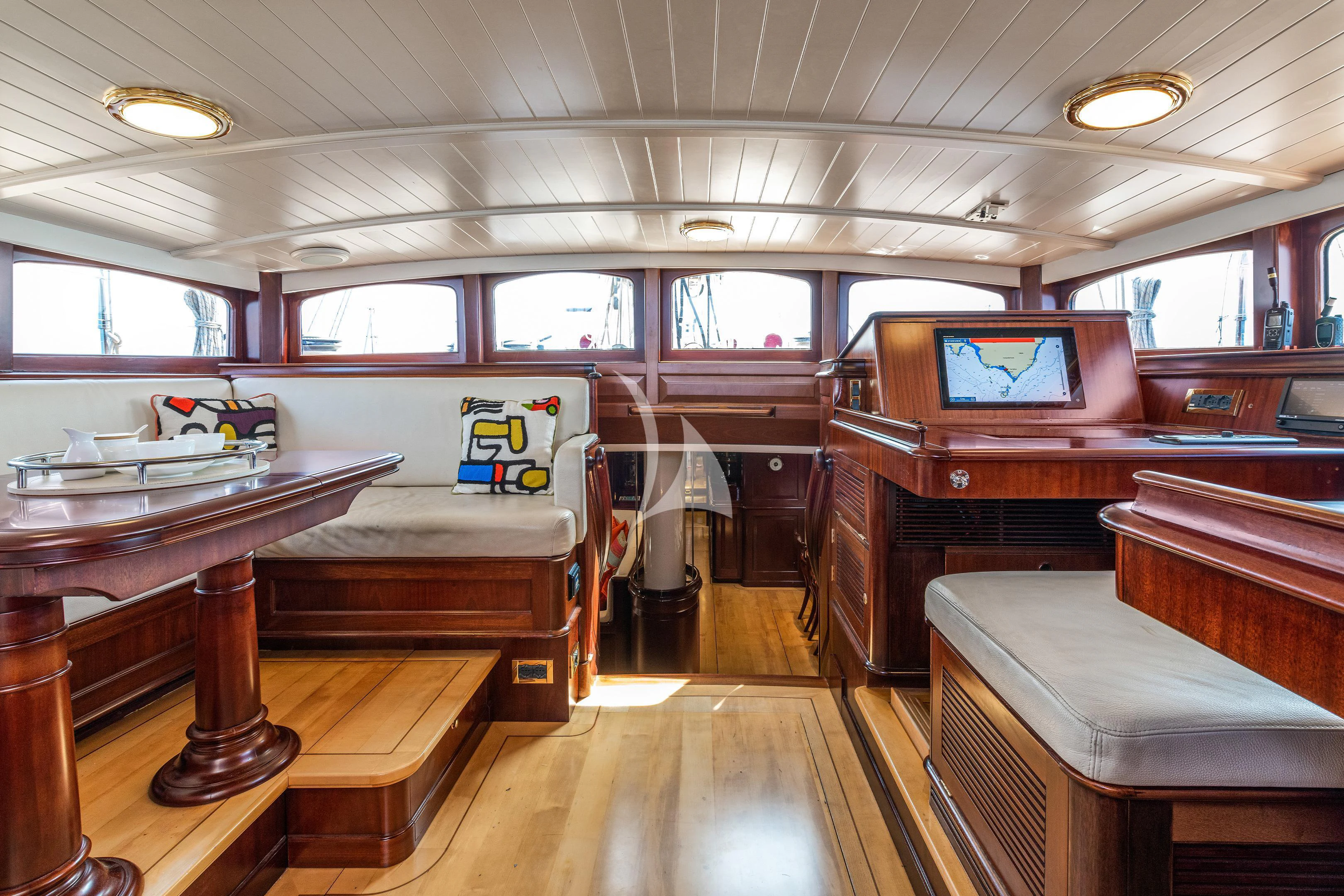 a room with tables and chairs aboard WINDROSE OF AMSTERDAM Yacht for Sale
