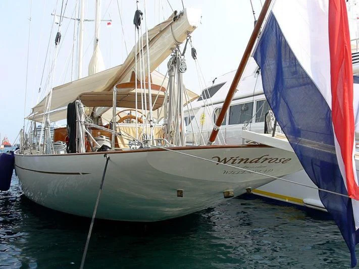 a boat with a flag aboard WINDROSE OF AMSTERDAM Yacht for Sale