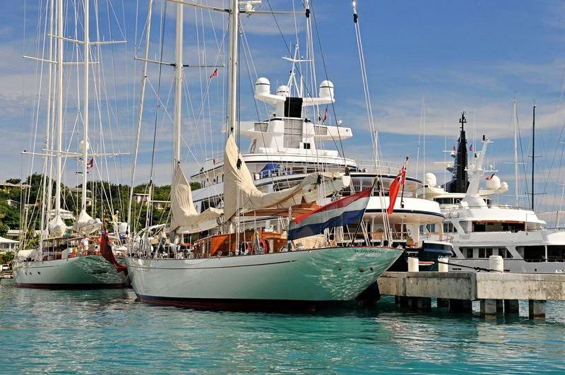 several boats docked at a pier aboard WINDROSE OF AMSTERDAM Yacht for Sale