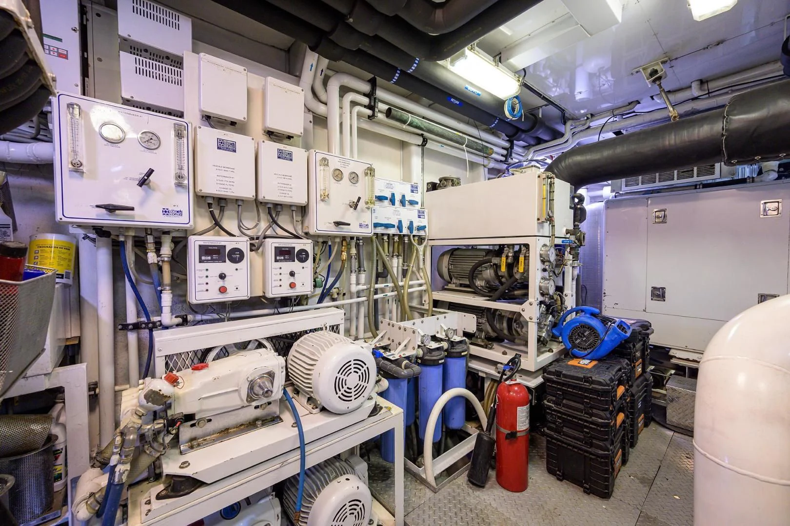 a room full of white machines aboard STARSHIP Yacht for Charter