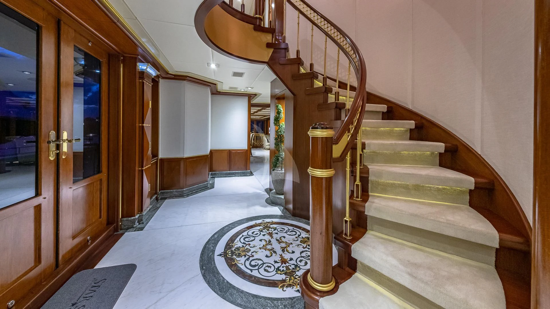 a staircase in a building aboard STARSHIP Yacht for Charter