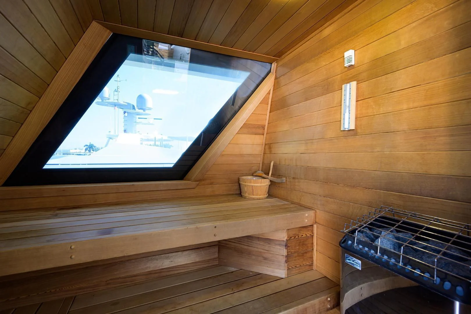 a wooden room with a wood ceiling aboard STARSHIP Yacht for Charter