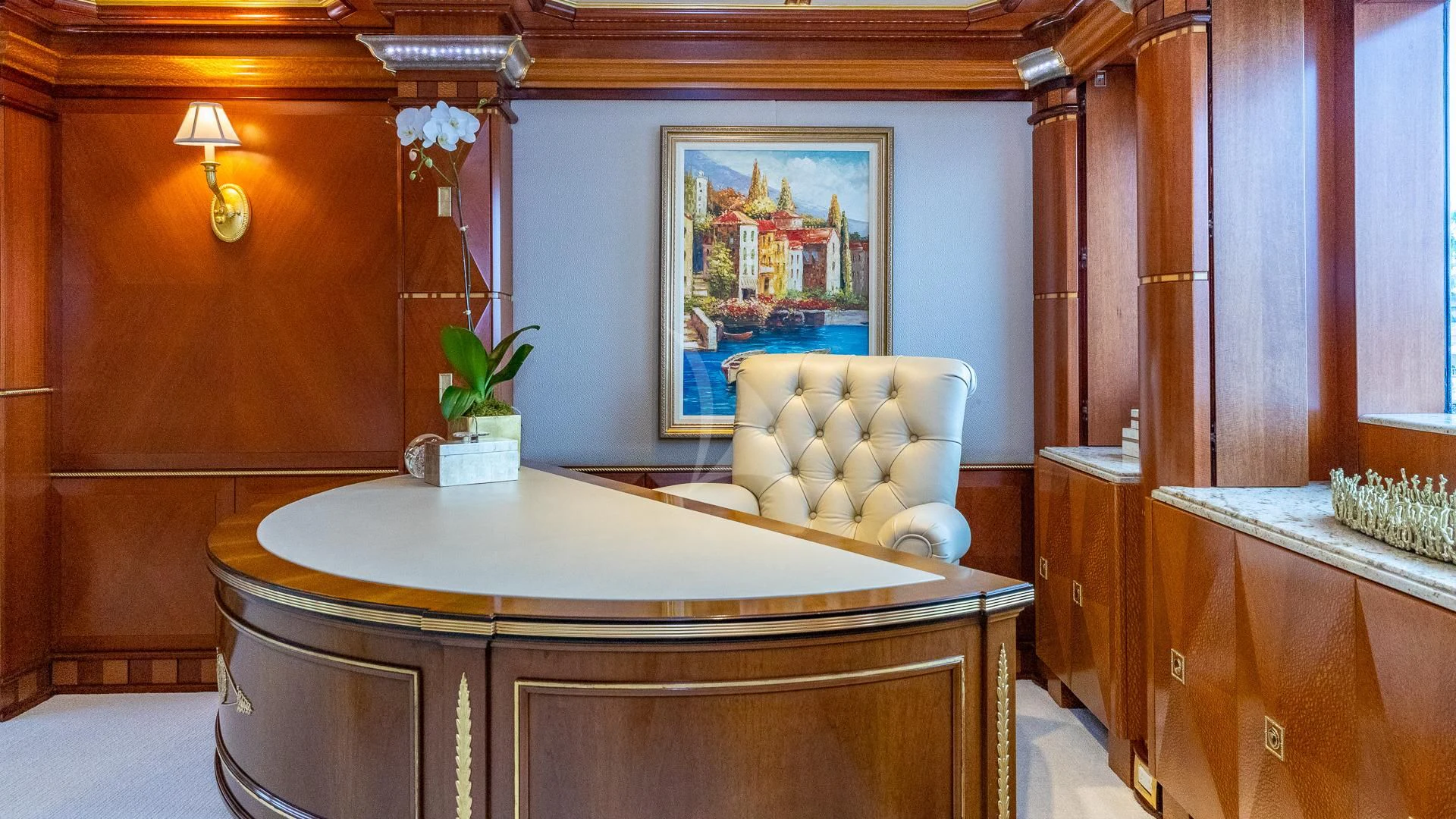 a kitchen with a table and chairs aboard STARSHIP Yacht for Charter