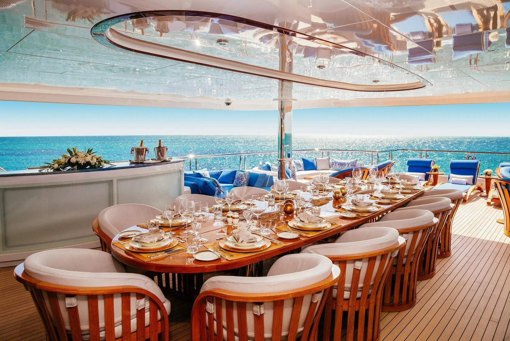 a table set for a dinner party aboard STARSHIP Yacht for Charter