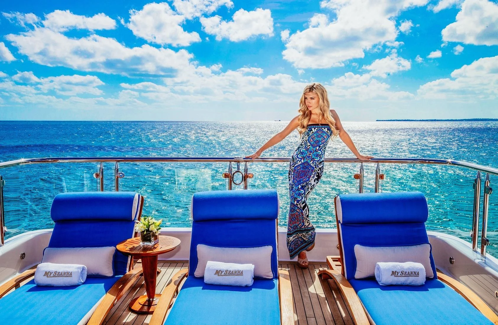 a woman standing on a boat aboard STARSHIP Yacht for Charter