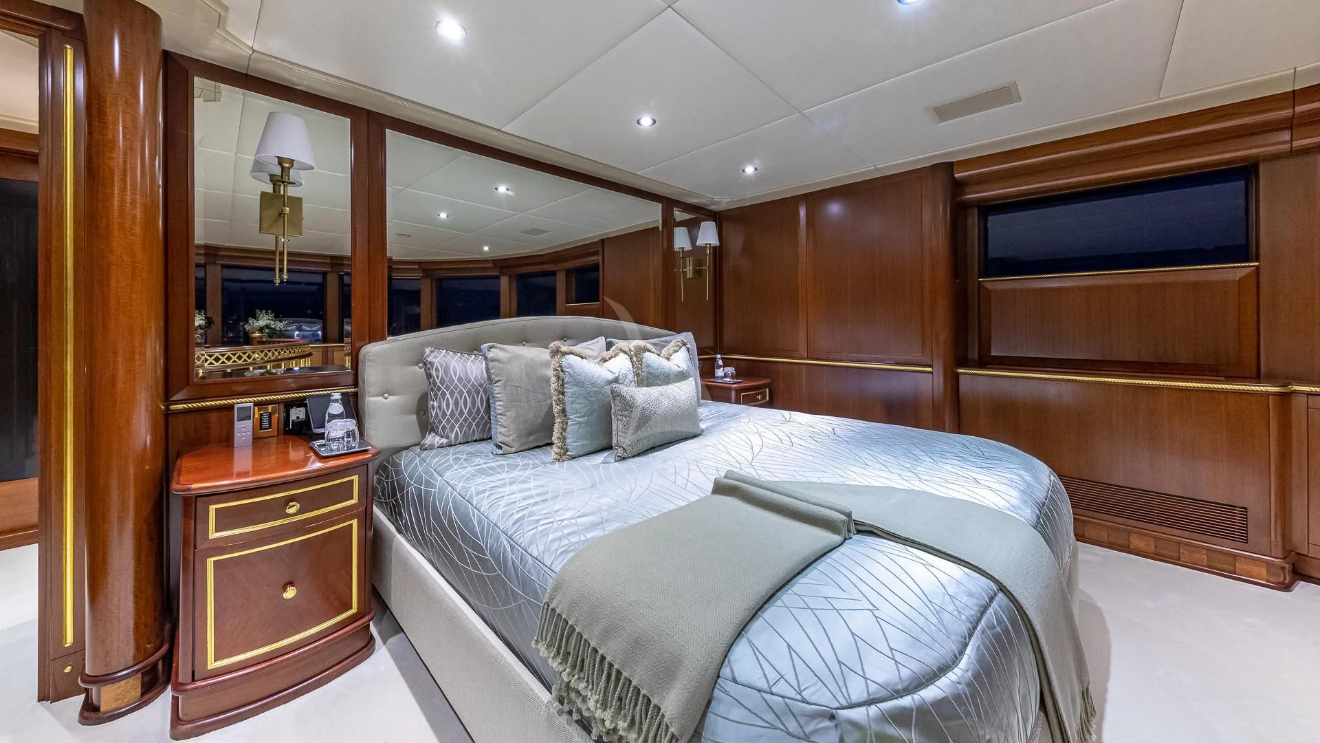 a bed in a room aboard STARSHIP Yacht for Charter
