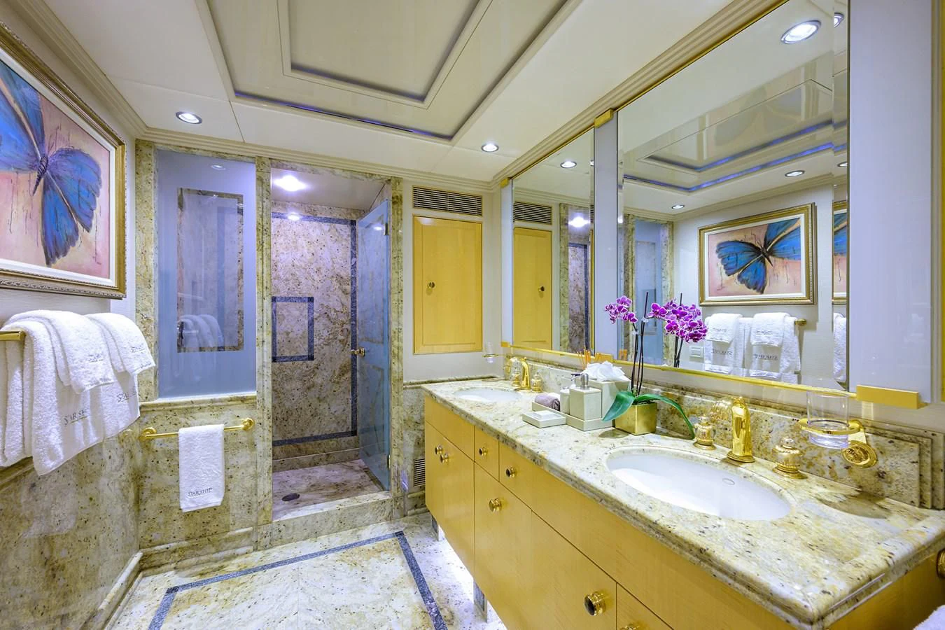 a bathroom with a large mirror aboard STARSHIP Yacht for Charter