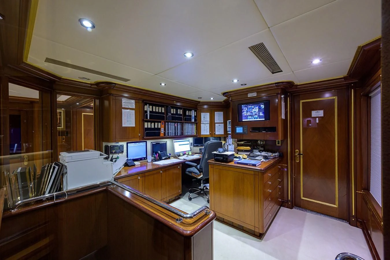 an office with computers aboard STARSHIP Yacht for Charter