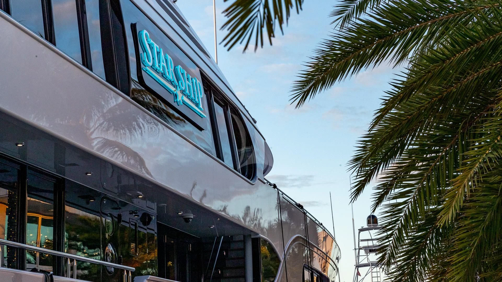 a building with a sign on the side aboard STARSHIP Yacht for Charter