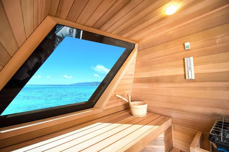 a large window in a wooden room aboard STARSHIP Yacht for Charter