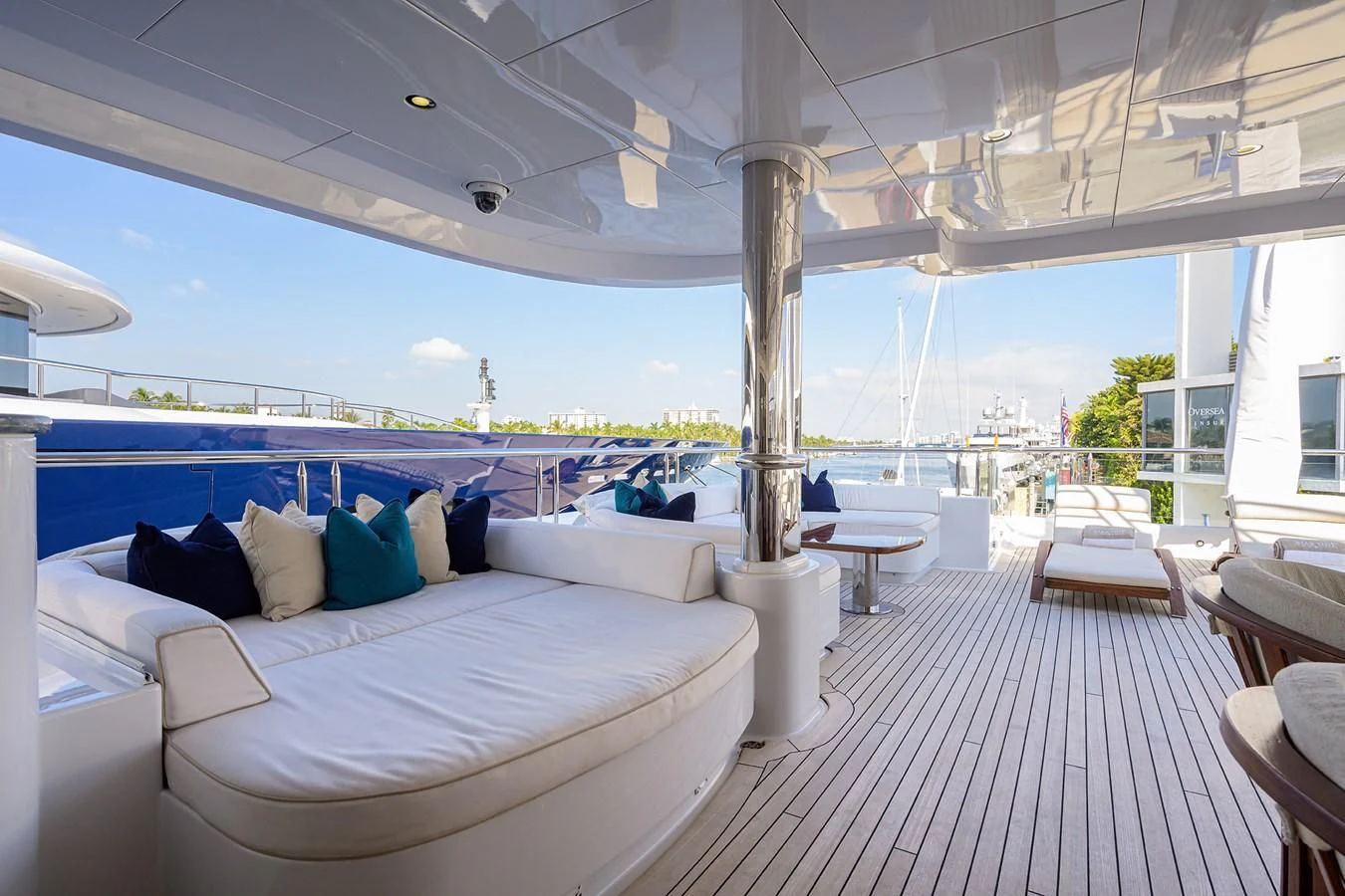 a room with a view of the ocean and a large patio aboard STARSHIP Yacht for Charter