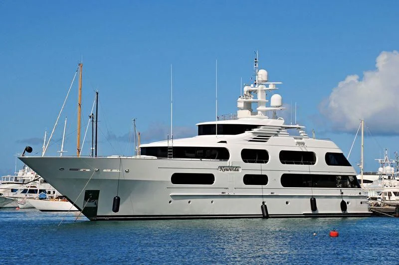 a white yacht in the water aboard STARSHIP Yacht for Charter