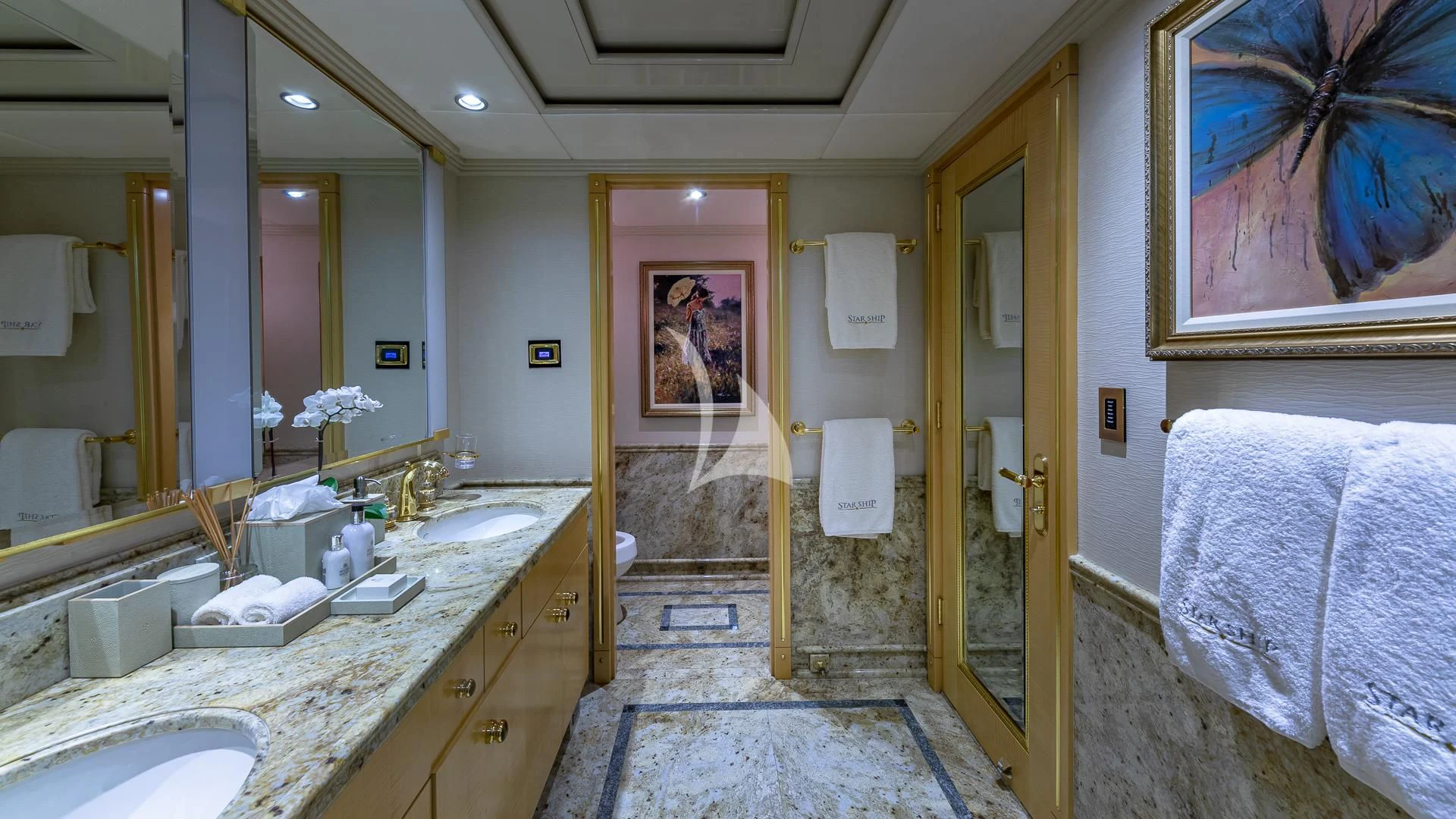 a bathroom with a marble countertop aboard STARSHIP Yacht for Charter