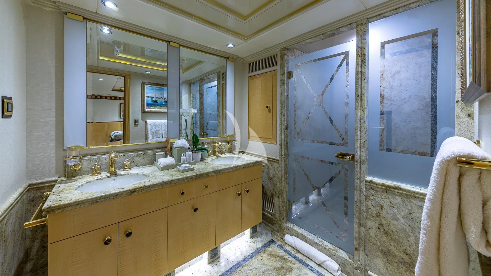 a bathroom with a large glass shower aboard STARSHIP Yacht for Charter